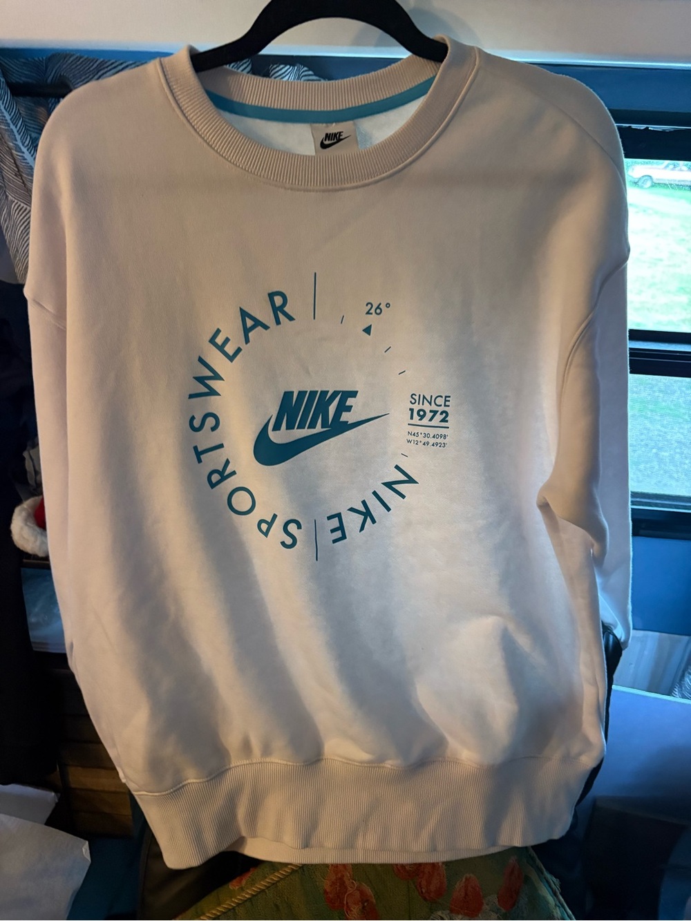 Nike women’s White Crewneck Sweatshirt with Teal Logo Graphic Size M